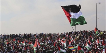 آلاف الفلسطينيين في مسيرة العودة بلبنان وهنية: في جعبتنا الكثير