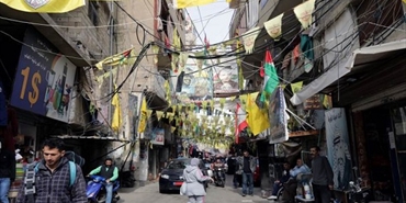 بين فتح وحماس: عصبية الانتماء إلى المخيم أقوى