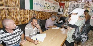 ‏اللجان الشعبية تستكمل توزيع الكوبونات الغذائية على العوائل الفلسطينية