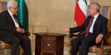 عباس إلى لبنان لتحييد مخيمات اللاجئين