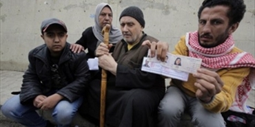 برنامج تسليم المساعدات النقدية للعائلات الفلسطينية القادمة من سوريا