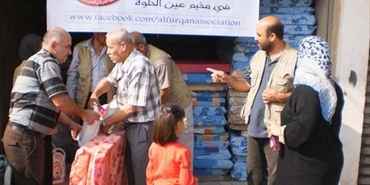 جمعية الفرقان للعمل الخيري تقدم فرش وحرامات وادوات تنظيف للنازحين السوريين