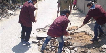 كشاف الاسراء تاهل مدخل مدرسة عين العسل في مخيم الرشيدية