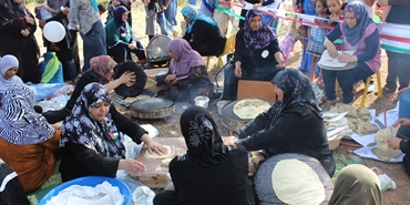 يوم مفتوح بمناسبة يوم اللاجئ العالمي بعنوان "لاجئ... بس راجع" في حديقة صور العامة