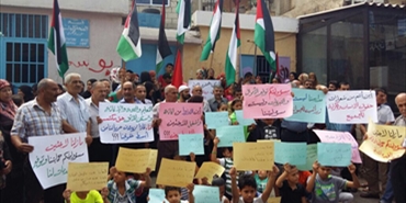 اعتصام فلسطيني في مخيم البرج الشمالي تنديدا لقرارات الاونروا