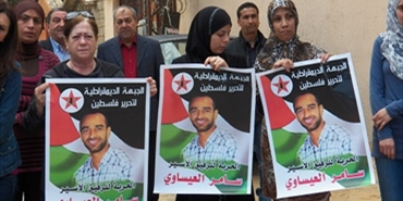 في يوم الاسيرالفلسطيني: إعتصام للمنظمة النسائية الديمقراطية الفلسطينية في مخيم البص