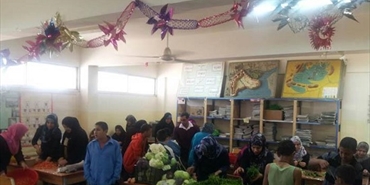 يوم صحي غذائي للطلاب في مدرسة فلسطين