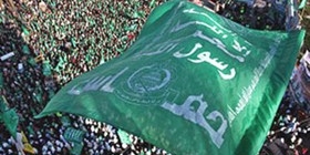 رفع راية التوحيد والعلم الفلسطيني على السياج الأمني الصهيوني
